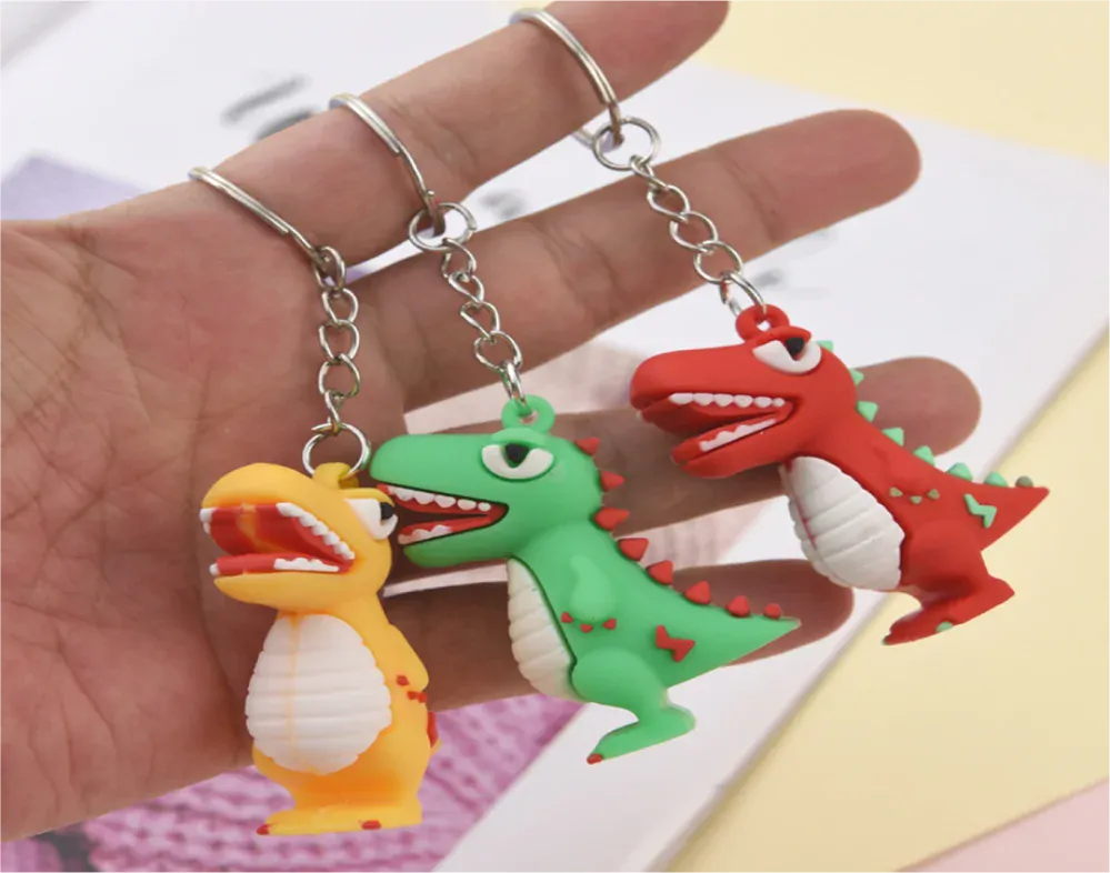 Přívěsek na klíče - DINOSAURUS 3 - ORANŽOVÝ