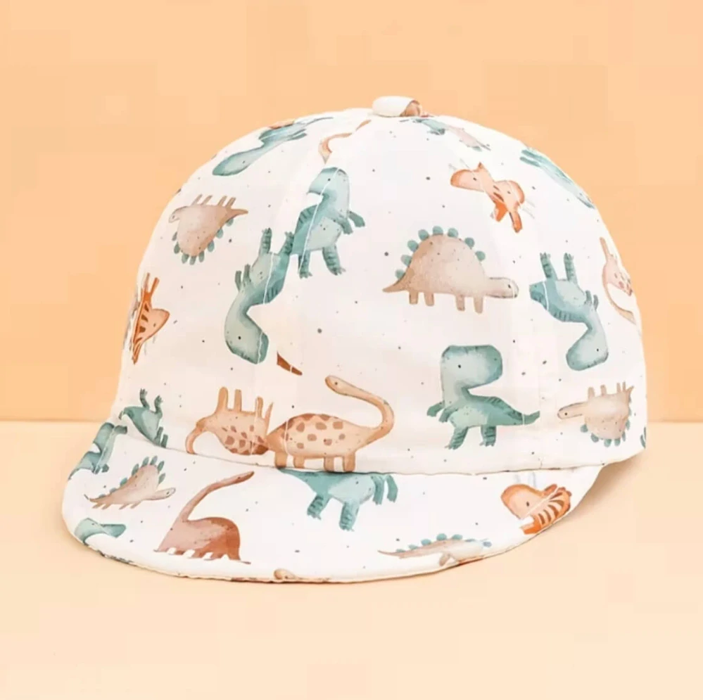 Dětská kšiltovka s dinosaury - DINO - SLONOVÁ KOST (12 m)