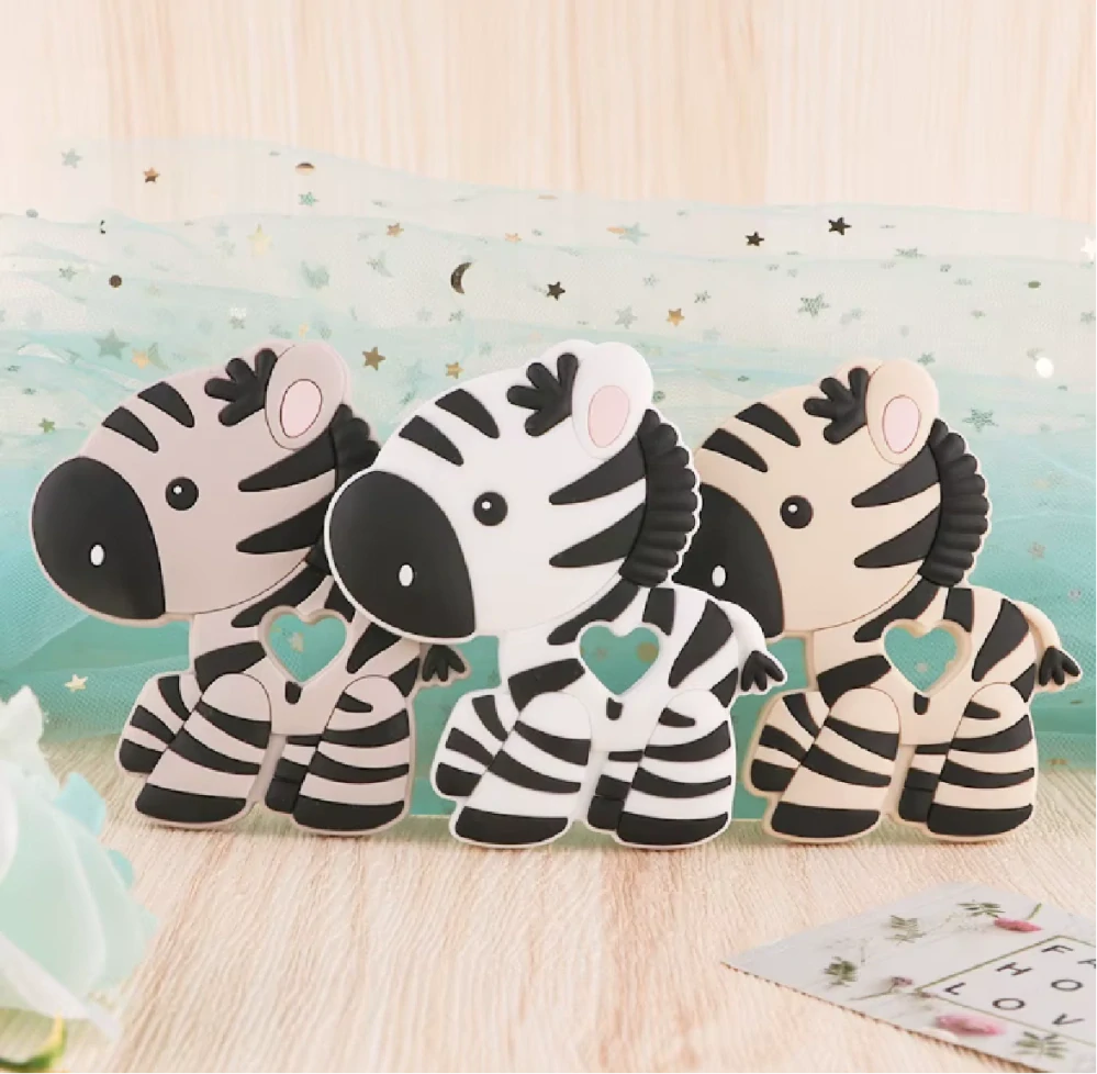 Silikonové kousátko - ZEBRA - SLONOVÁ KOST