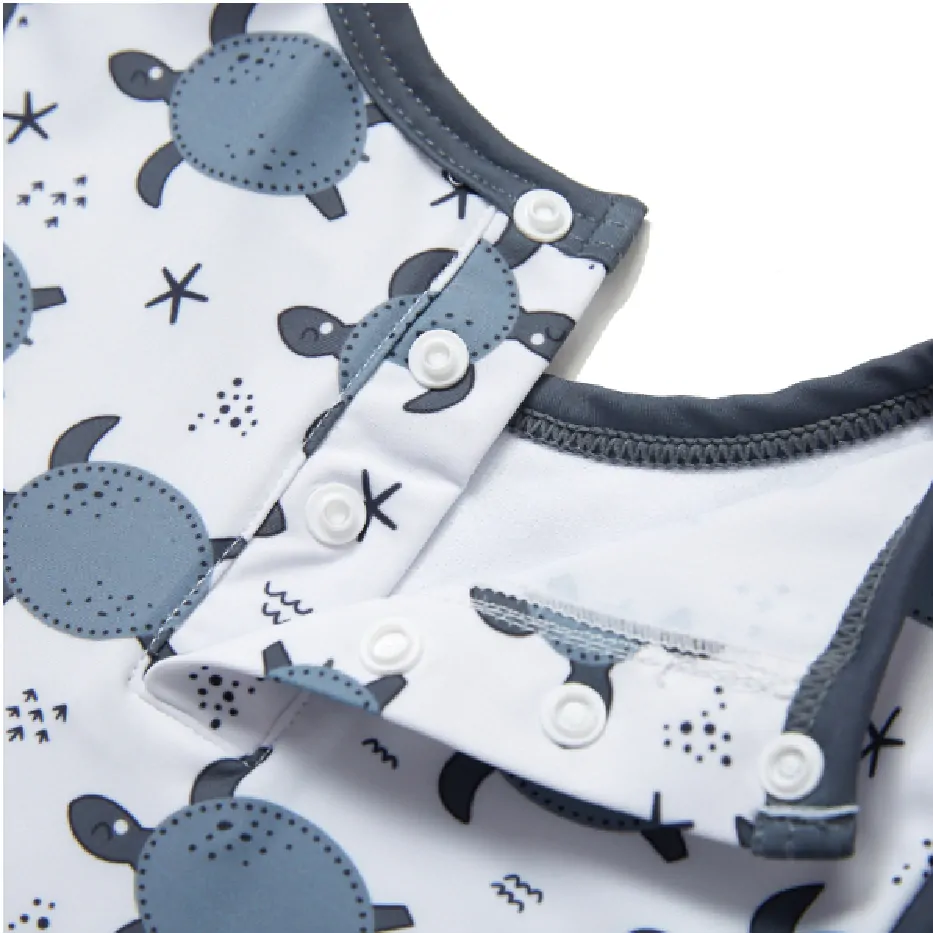 Jednodílné plavky/overal s krátkými rukávy a čepicí (18-24 m) - ŽELVY