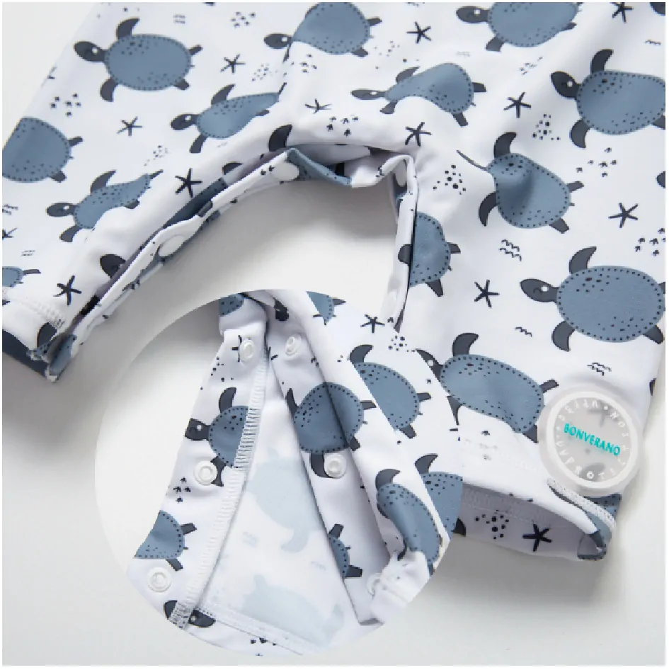 Jednodílné plavky/overal s krátkými rukávy a čepicí (18-24 m) - ŽELVY