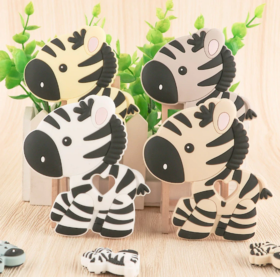 Silikonové kousátko - ZEBRA - SLONOVÁ KOST