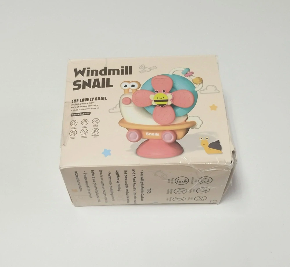 Senzorická hračka chrastítko s přísavkou - VĚTRNÝ ŠNEK - ORANŽOVÝ