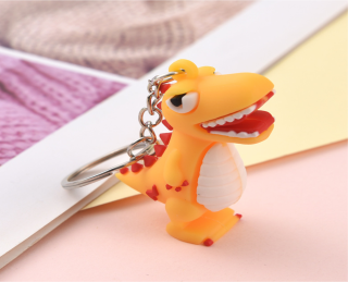 Přívěsek na klíče - DINOSAURUS 3 - ORANŽOVÝ