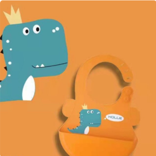 Silikonový bryndáček - DINOSAURUS - ORANŽOVÝ